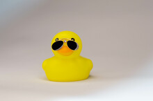 Yellow Rubber Duck On White Background In Black Sunglasses
