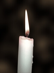 Wall Mural - Vertical shot of a white candle glowing in the dark