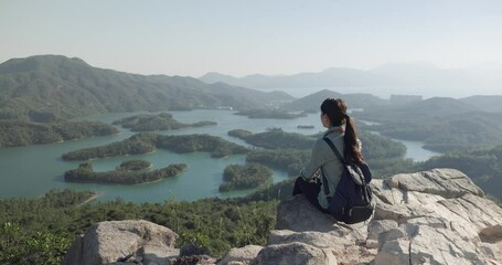 Canvas Print - Woman sit at the top of mountain