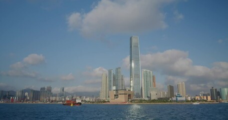 Fototapete - Take boat cross the harbor in kowloon west