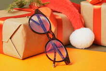 Beatiful Trendy Eye Glasses On Gift Box With Red Ribbon, Christmas Optic Store Sale
