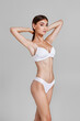 © producer - slim woman with perfect body in white underwear