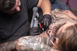© Mr. Prof - Master create tattoo in tattoo parlour