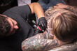 © Mr. Prof - Professional tattooer create tattoo in salon