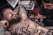 © Mr. Prof - Professional tattoo artist makes cool tattoo in tattoo studio