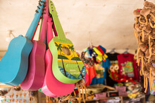 Carmen, Bohol, Philippines - Colorful Guitars And Other Souvenirs For Sale For Tourists At A Local Store.