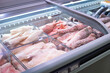 Fresh frozen fish in the refrigerator in the supermarket