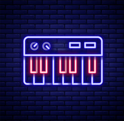 Wall Mural - Glowing neon line Music synthesizer icon isolated on brick wall background. Electronic piano. Colorful outline concept. Vector