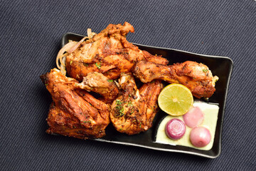 Wall Mural - Tandoori Chicken with Chutney, Onion and Lemon