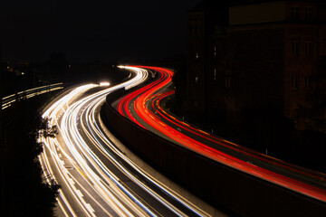 Wall Mural - Traffic on a Saturday evening on the highway leaving the city of Karlsruhe  #