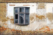 Old window on the wall of an old house in Lokve, Banat, Serbia