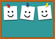 © Chitraporn - Happy face of white paper with pin and blank green board on orange background. Concept for positive thinking, mental health assessment, world mental health day. space for the text. paper art design.