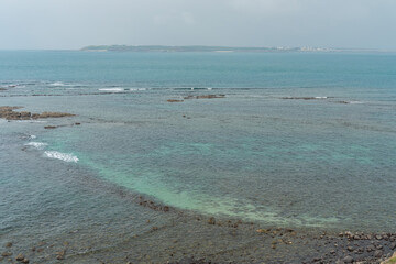 Wall Mural - Twin Hearts Stone Weir cover in water at Penghu island