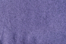 Wrinkled Textured Surface Of Purple Wool Knitted Fabric
