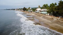 Vietnam Coastal Town And Sandbags To Stop Beach Erosion, Aerial Drone View