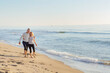 © Westend61 - Couple spending leisure time at beach
