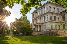 Germany, Bavaria, Munich, Sun Shining Over Lawn Of Academy Of Fine Arts