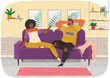 © robu_s - Couple sitting on couch at home in living room interior and talking. Family stay at home, communicating. Man and woman enjoy together, discussing plans for future. Young family spend time together