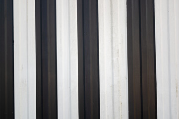 Wall Mural - Closeup shot of black and white metal fence texture