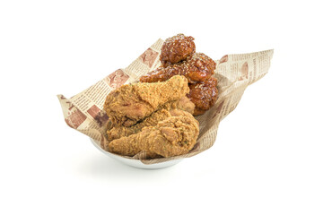 Wall Mural - Closeup shot of Korean fried chicken isolated on a white background