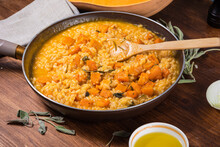 Cooking Pumpkin Risotto - Risotto In A Pan With Chunks Of Baked Pumpkin, Close-up