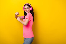 Profile Side Photo Of Young Pretty Lady Have Fun Dancing Club Listen Music Earphones Isolated Over Yellow Color Background