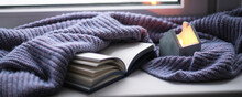 Open Book, Candle Holders With Lit Candle At Home. Selective Focus. Banner