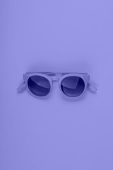 Poster - Purple very peri color sun glasses. Monochrome fashion flat lay