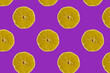 Fruit pattern. Colorful pattern of lemon slices on a purple background. Photo collage. Minimum sample of summer fruits for recipes.