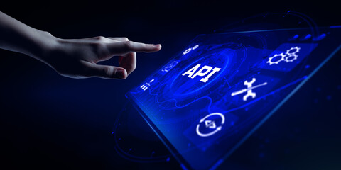 API Application Programming interface software web development concept. Hand pressing button on screen.