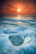 Vertical Shot Of Glaciers In The Baltic Sea Coast At The Beautiful Sunset In Palanga, Lithuania