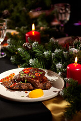 Dinner table Christmas dishes: fish, chicken, meat.