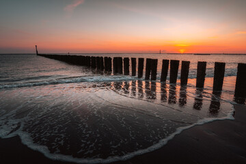 Wall Mural - beautiful sunset above the sea. westkapelle, zeeland, the netherlands.
