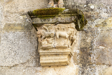 Canvas Print - Corbels in the church of the Monastery of Saint Mary of Carracedo in Carracedelo, El Bierzo, Spain