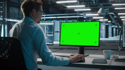 Aufkleber - High-Tech Data Center Server: IT Specialist Administrator Working on Green Screen Chroma Key Computer. Monitoring Web Services, Cloud Computing, Analytics Facility, Maintenance of Cyber Security