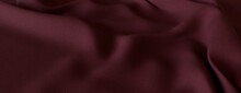 Burgundy Cloth With Wrinkles And Folds. Tactile Surface Banner.