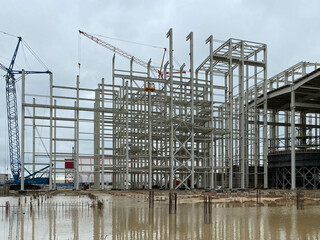 Wall Mural - Industrial construction cranes and buildings