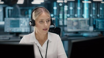 Wall Mural - Call Center Office: Portrait of Friendly Caucasian Female Technical Customer Support Specialist Talking on a Headset, uses Computer. Client Experience Officer Helps Online via Video Conference