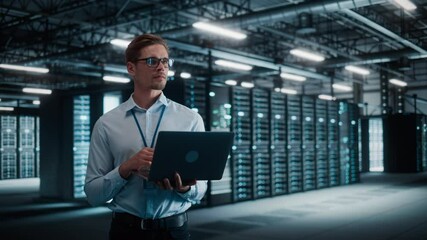 Leinwandbilder - Big Data Center Chief Technology Officer Using Laptop Computer. Server Farm Cloud Computing Facility with System Administrator Working. Software as Solution and Cloud Computing with Cyber Security