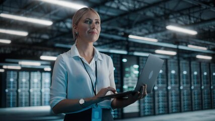 Aufkleber - Successful Female Chief Technology Officer Using Laptop Computer, Standing in Big Warehouse Data Center. System Administrator Maintenance of SAAS, Cloud Services Server. Digital Entrepreneur. Static
