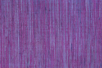 Wall Mural - Detail of burgundy woven fabric as background or texture