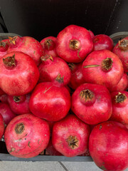 Sticker - Vertical shot of pomegranate fruit harvested on Corfu island, Greece