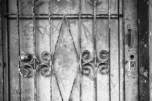 Black And White Rustic Weathered Iron Bars And Door