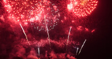 Red Firework Celebrate Anniversary Happy New Year 2022, 4th Of July Holiday Festival. Red Firework In Night Time Celebrate National Holiday. Countdown To New Year 2022 Festival Party Time Event