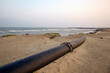 sea water intake pipe at the beach