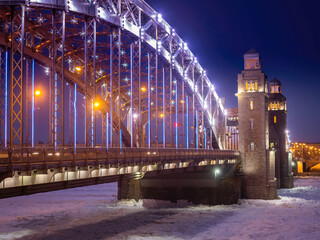 Wall Mural - Saint petersburg winter. Russia Christmas. Bolsheokhtinsky bridge in winter evening. Bridge in Saint Petersburg with Christmas lights. Frozen Neva. Christmas landscape. New year Russian Federation