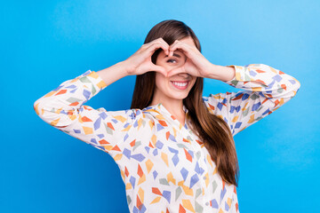 Sticker - Photo of sweet adorable young lady wear print shirt smiling showing hands arms heart close eye isolated blue color background