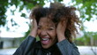 © Marco - Angry upset black woman yelling and screaming in frustration