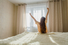 Girl Woke Up In Her Bed On A Sunny Morning. Lack Of Sleep Concept. Horizontal Composition. Bad