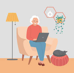 Wall Mural - Elderly woman on comfortable couch and using laptop at living room. Vector flat style illustration